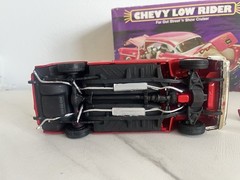 Revell Chevy Low Rider 1:25 Scale Model Kit Partially Built With Some Parts Box