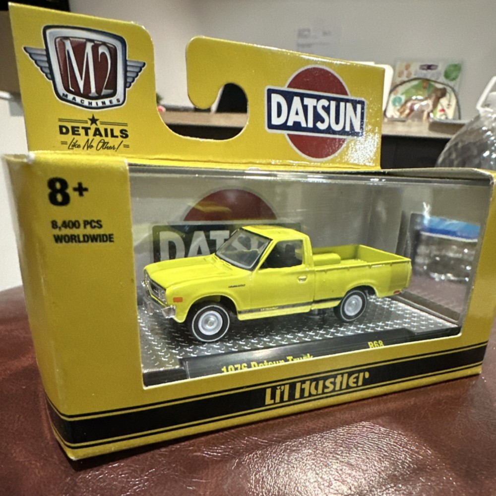 M2 Machines 1976 Datsun Truck Li’l Hustler Yellow Diecast Car Model