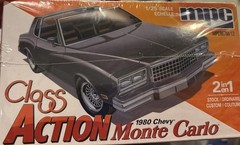 MPC967 – 80 Chevy Monte Carlo With Chopper & Trailer 1:25 Scale Model Kit Sealed