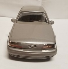 NIB Ertl 1/24 scale 1989 Ford Taurus SHO ( Titanium Met ) promo model #6054