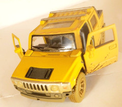 Kintoy 1/40 scale, Die-cast, Painted Dirty Mustard, pull back 2005 Hummer H2 SUT