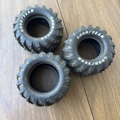 vintage 1 1/10 scale monster truck tires featuring prominent Goodyear lettering