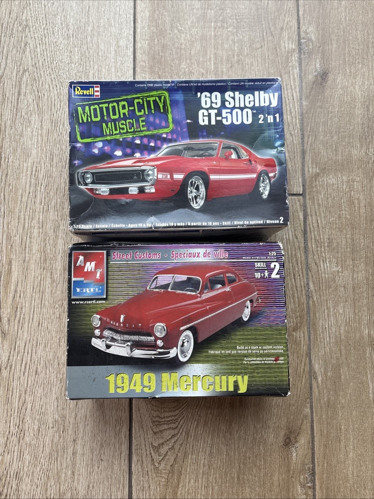 two 1:25 scale plastic model kits- ‘49 Mercury and ‘69 Shelby GT-500