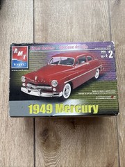 two 1:25 scale plastic model kits- ‘49 Mercury and ‘69 Shelby GT-500