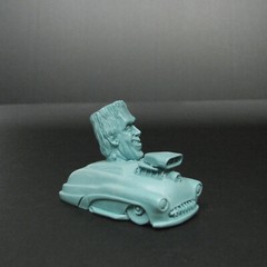 Jimmy Flintstone resin Lil Shitzz Happy Herman Munster aboard a ’49 Merc LS5