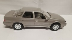 NIB Ertl 1/24 scale 1989 Ford Taurus SHO ( Titanium Met ) promo model #6054