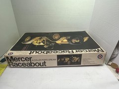 The 1/16 ENTEX #8452 Mercer Raceabout Yellow Unbuilt Model Car Kit is a plastic