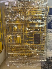 The 1/16 ENTEX #8452 Mercer Raceabout Yellow Unbuilt Model Car Kit is a plastic