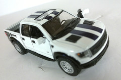 Kintoy White w/ Dark Blue stripes 2013 Ford F150 SVT Raptor die cast pull back
