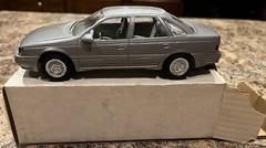 NIB Ertl 1/24 scale 1989 Ford Taurus SHO ( Titanium Met ) promo model #6054