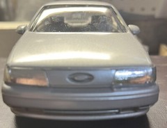 Ertl 1/24 scale 1989 Ford Taurus SHO ( Titanium Met ) promo model #6054