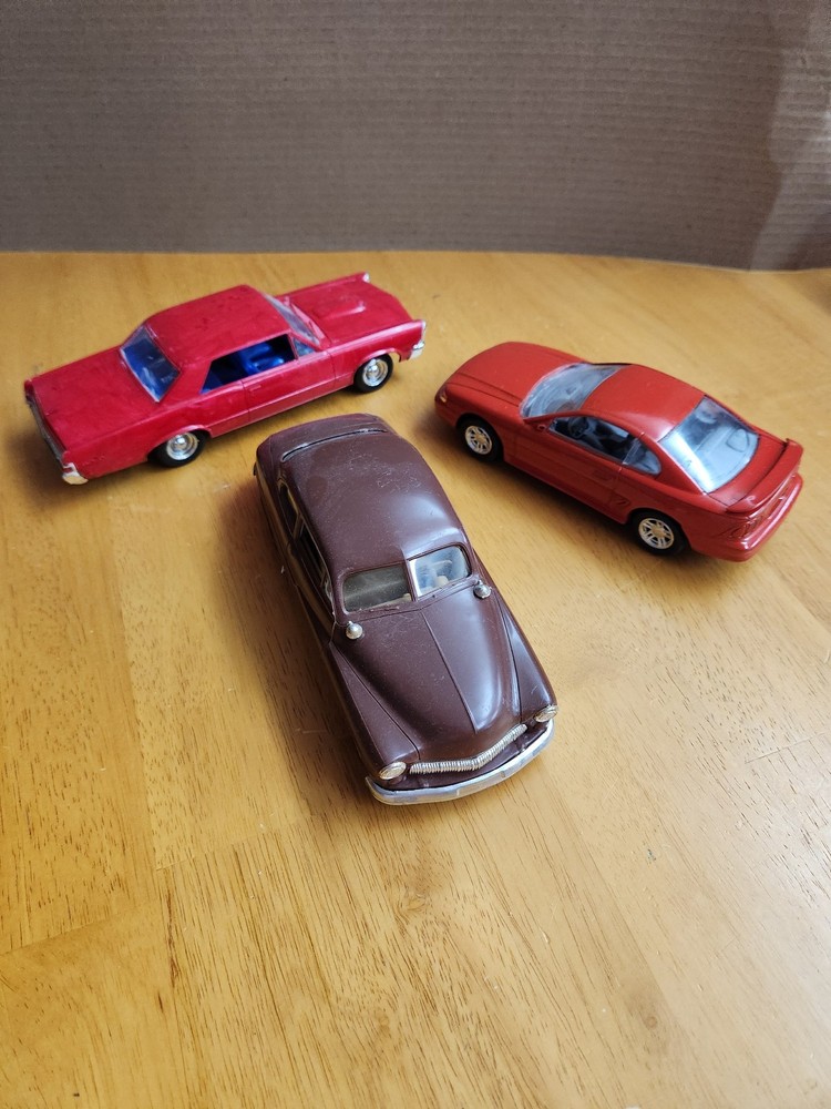 THREE VINTAGE BUILT MODELS -Mustang, GTO, and Mercury cruiser